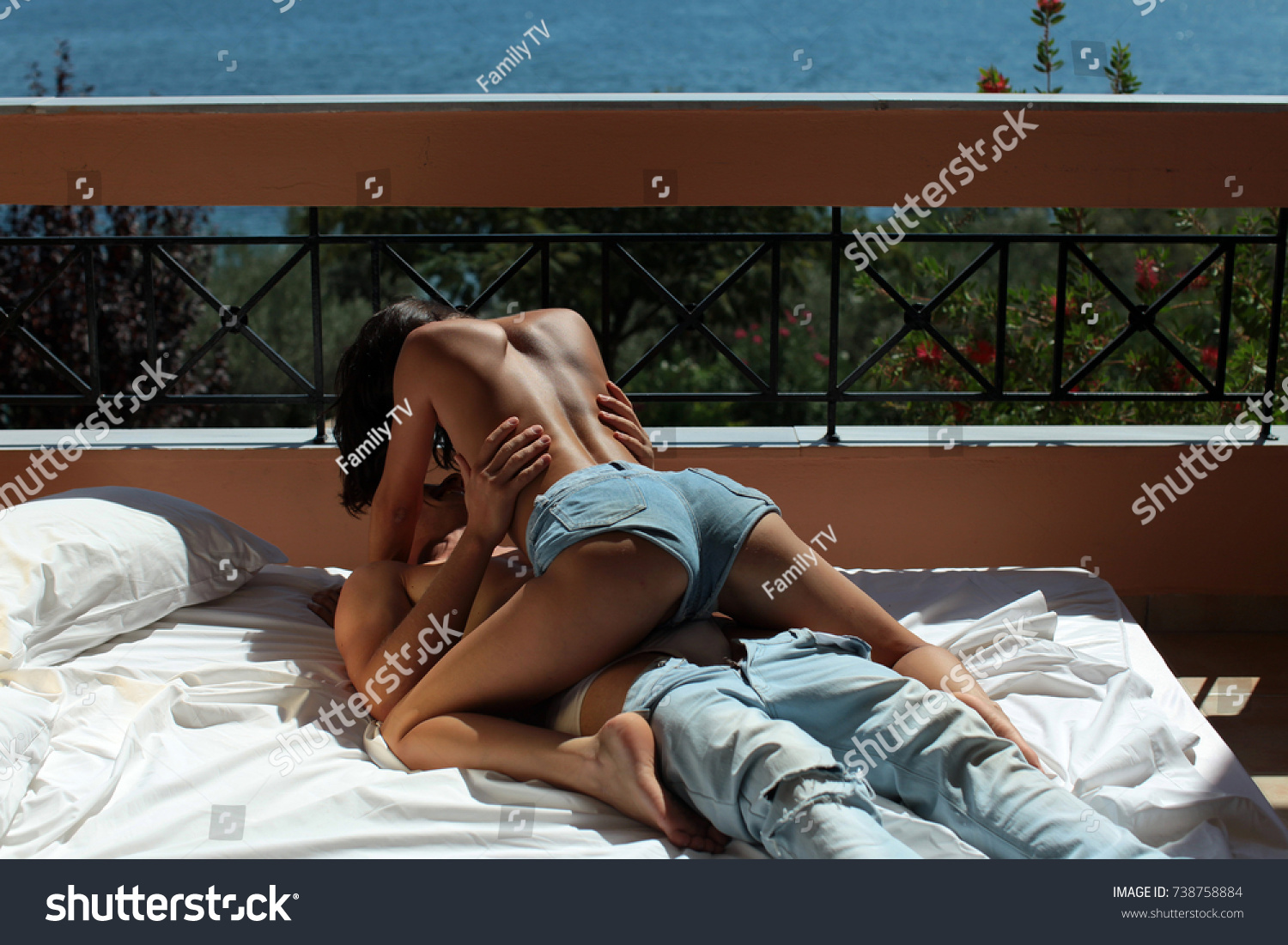 Passionate couple kissing, boy and girl. Having sex. Young lovers. People in love. Positions kamasutra. Erotic moments. Concept photo. Secret. Fashion. Hot babe. Party. Night background. Sex couple. #738758884