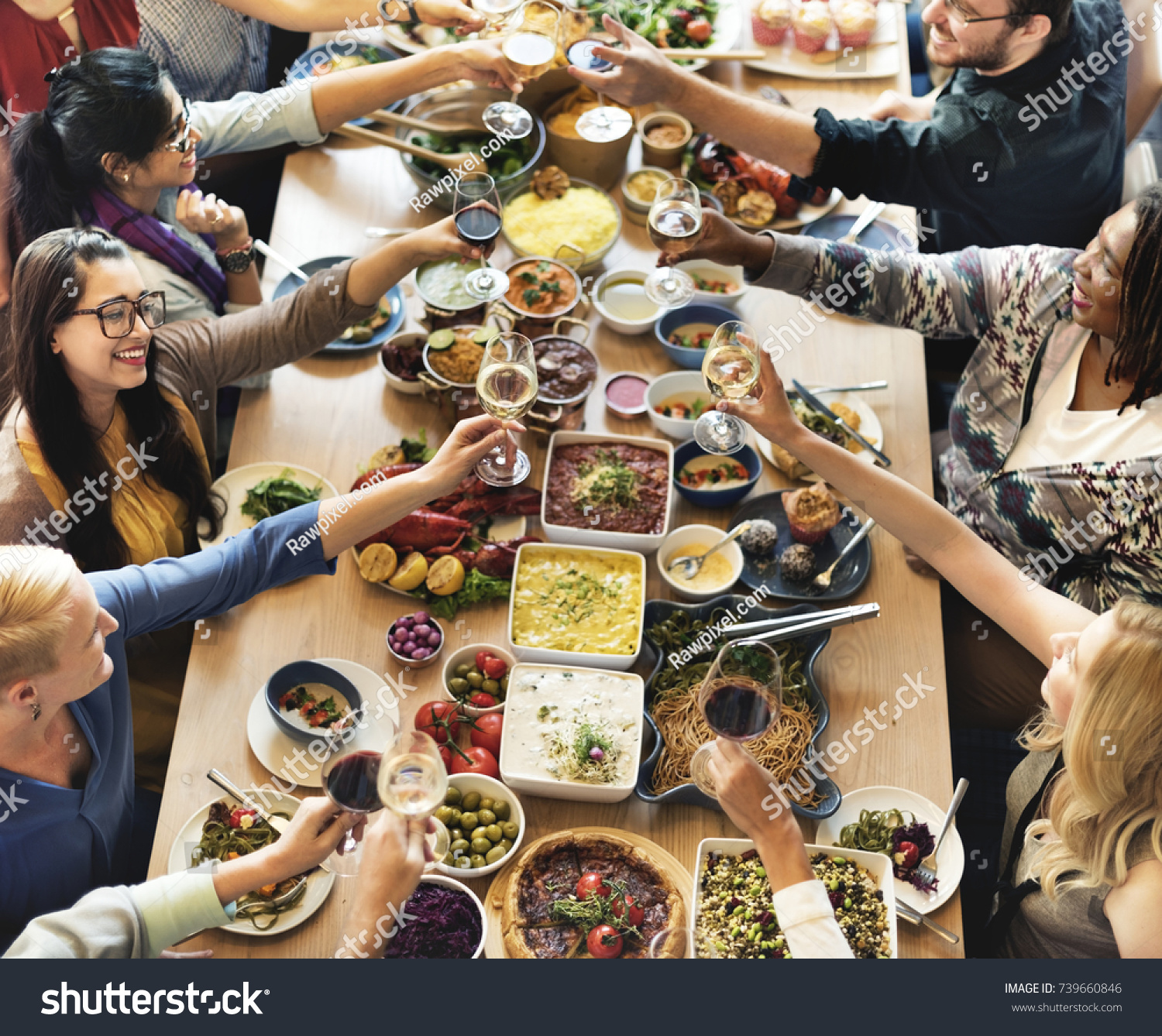 Group of diverse people are having lunch together #739660846