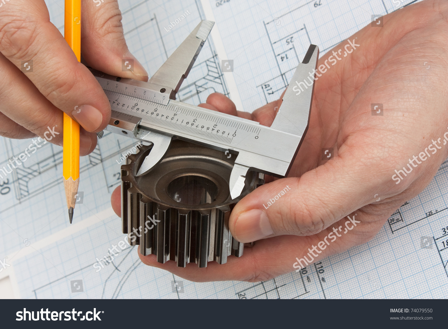 technical drawing and tools in hand #74079550