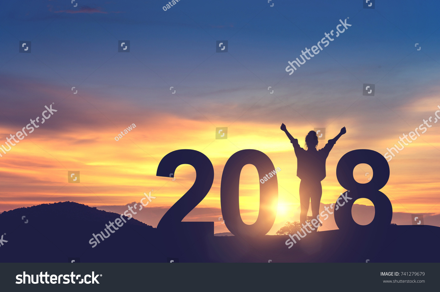 Silhouette freedom young woman Enjoying on the hill and 2018 years while celebrating new year, copy spce. #741279679