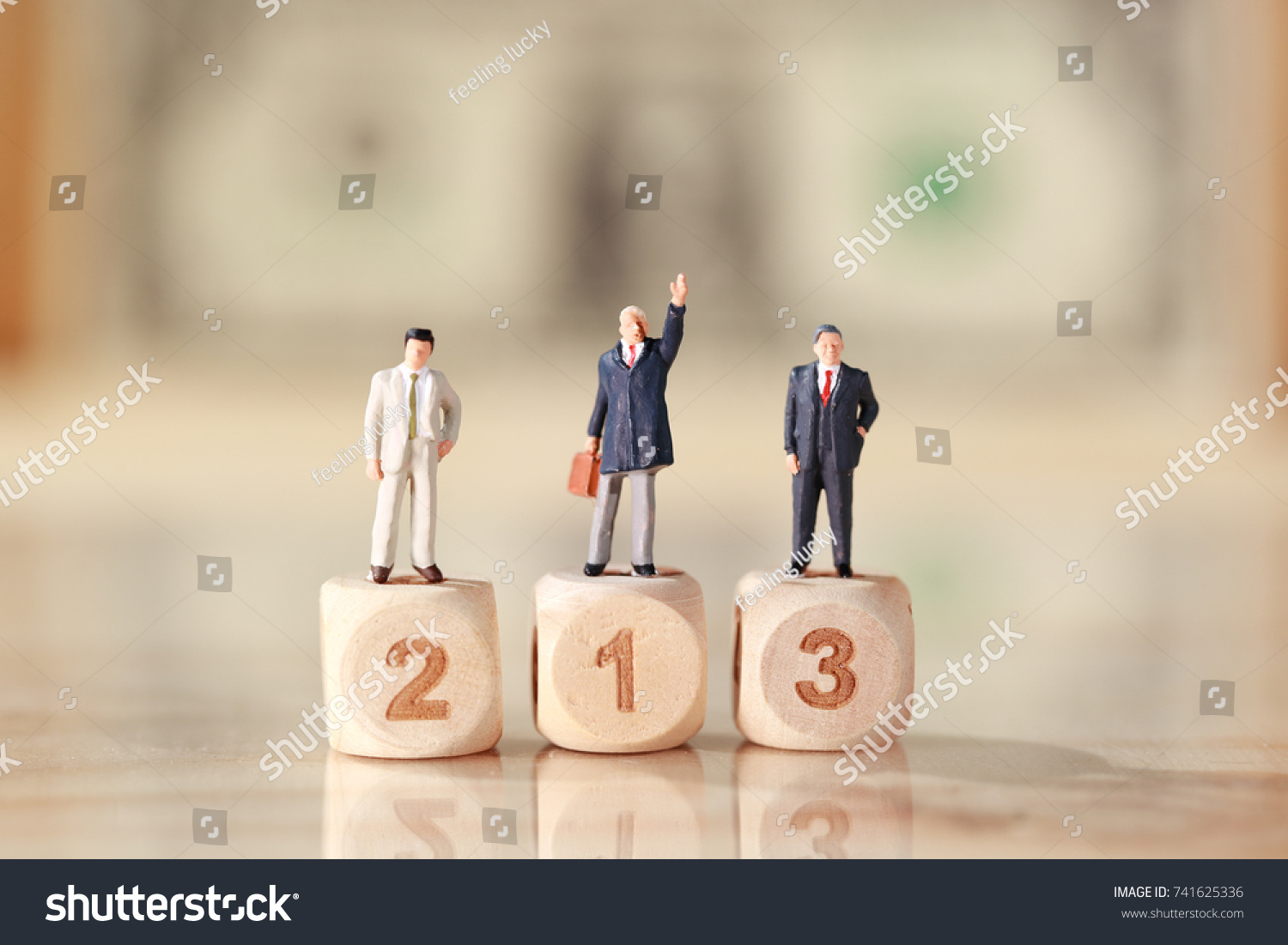 Miniature people: businessman standing on wooden podium with dollar bank note blur background (Financial and Business competition concept) #741625336