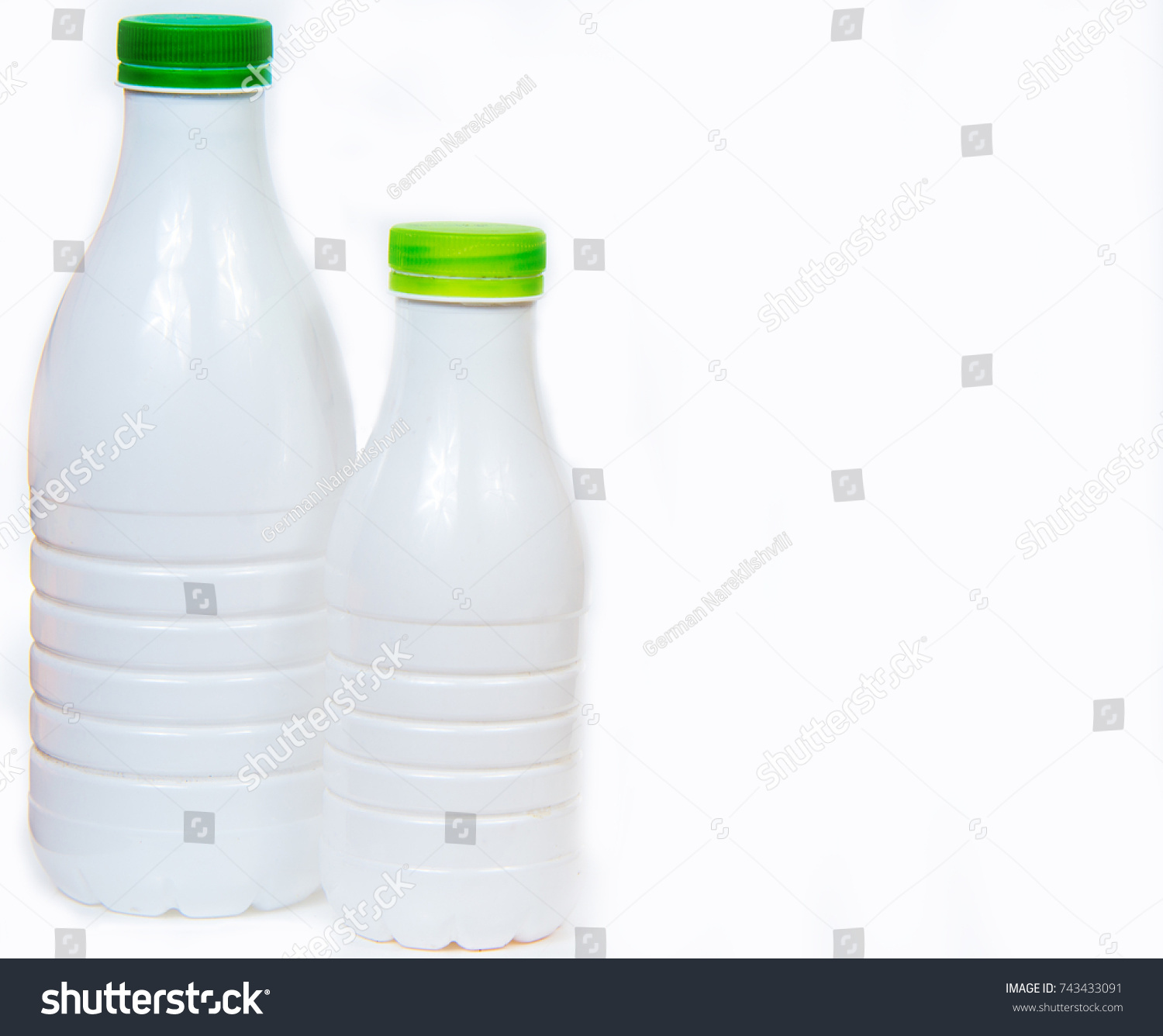 White bottle with green cover on white background #743433091