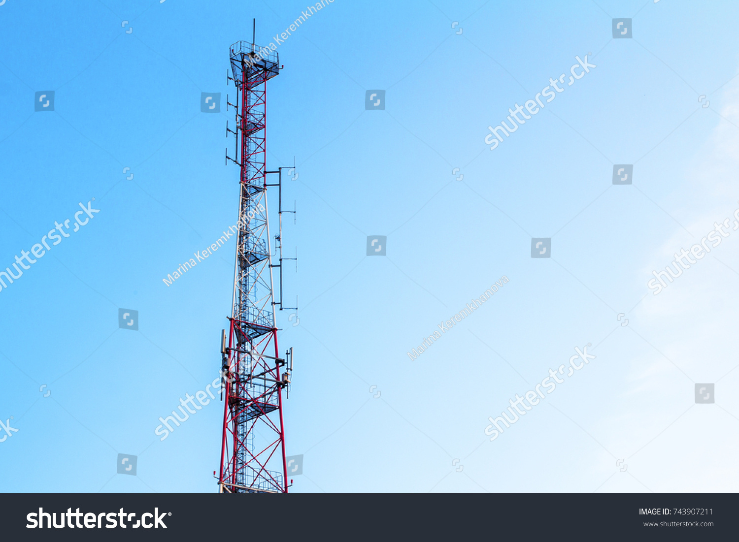  cellular tower design on a blue sky background / cellular tower #743907211
