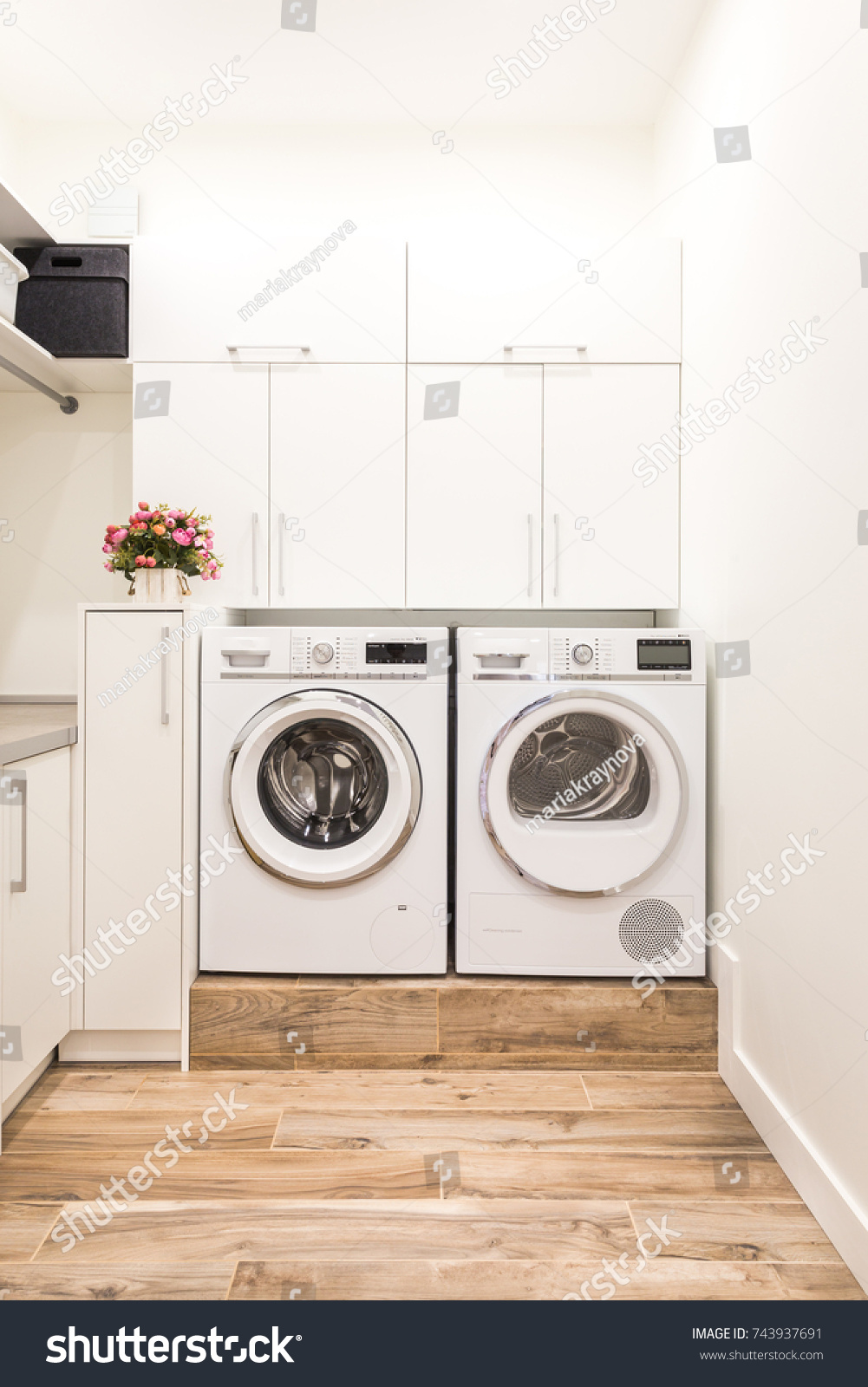 Laundry room with washing and drying machines #743937691