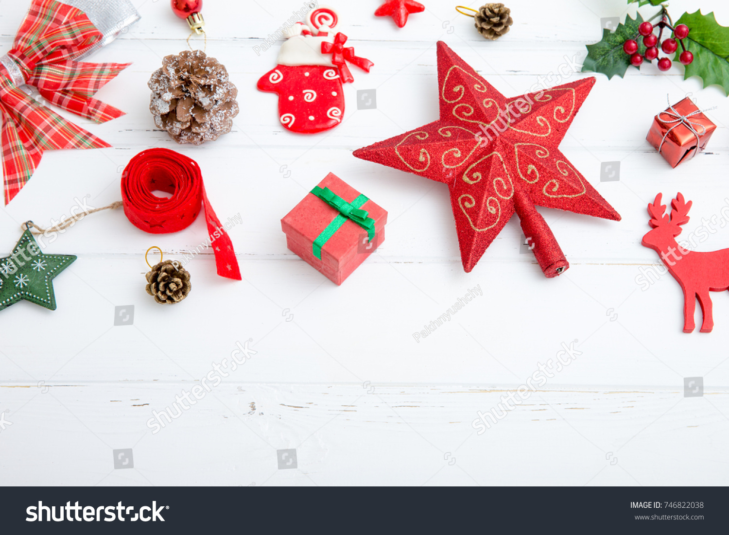 Christmas background with decorations and gift boxes on wooden board #746822038