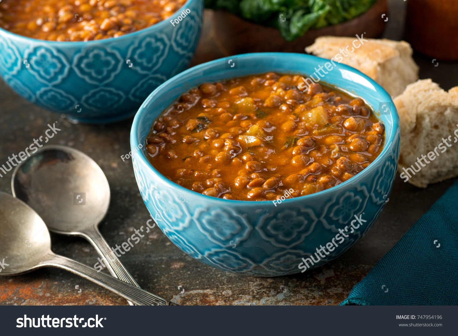 A bowl of delicious hearty homemade curried lentil soup. #747954196