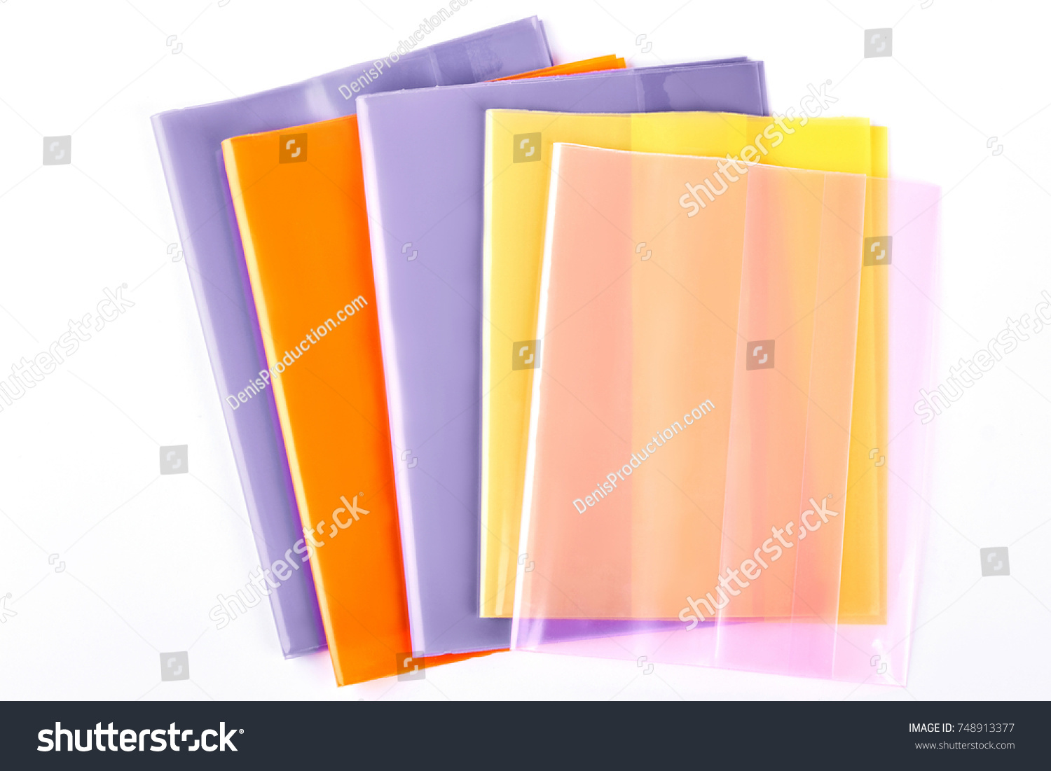 Set of colorful folders for documents. Multicolored documents files holders on white background. Office products on sale. #748913377