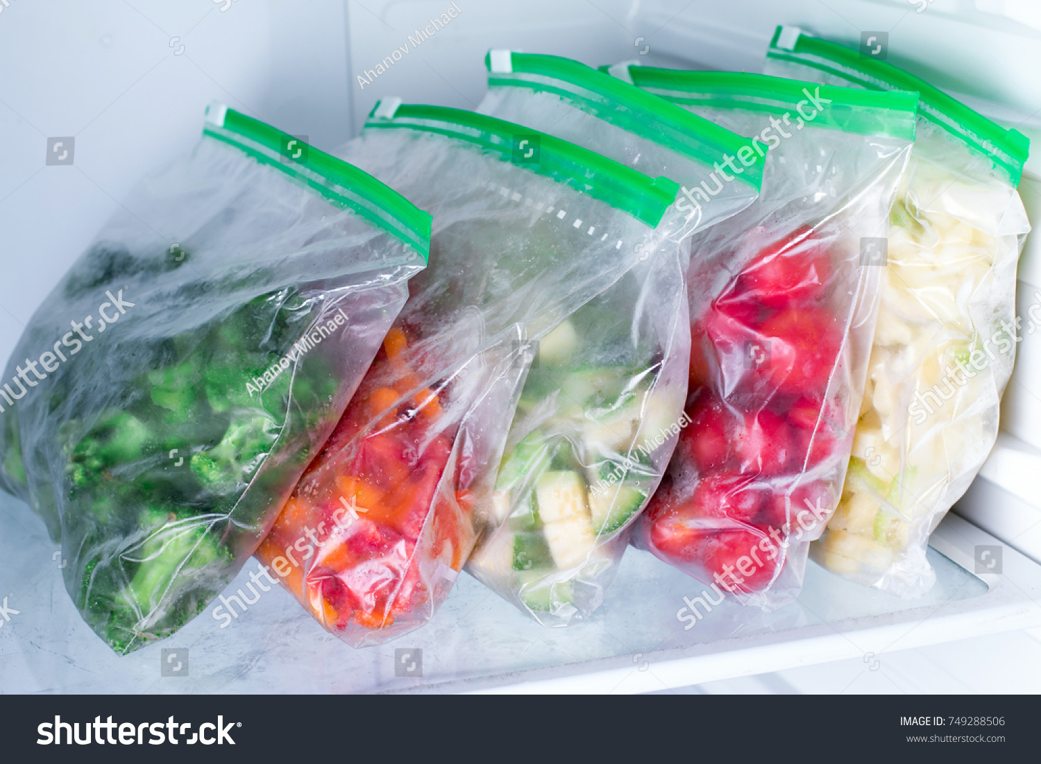 Bags with frozen vegetables in refrigerator #749288506