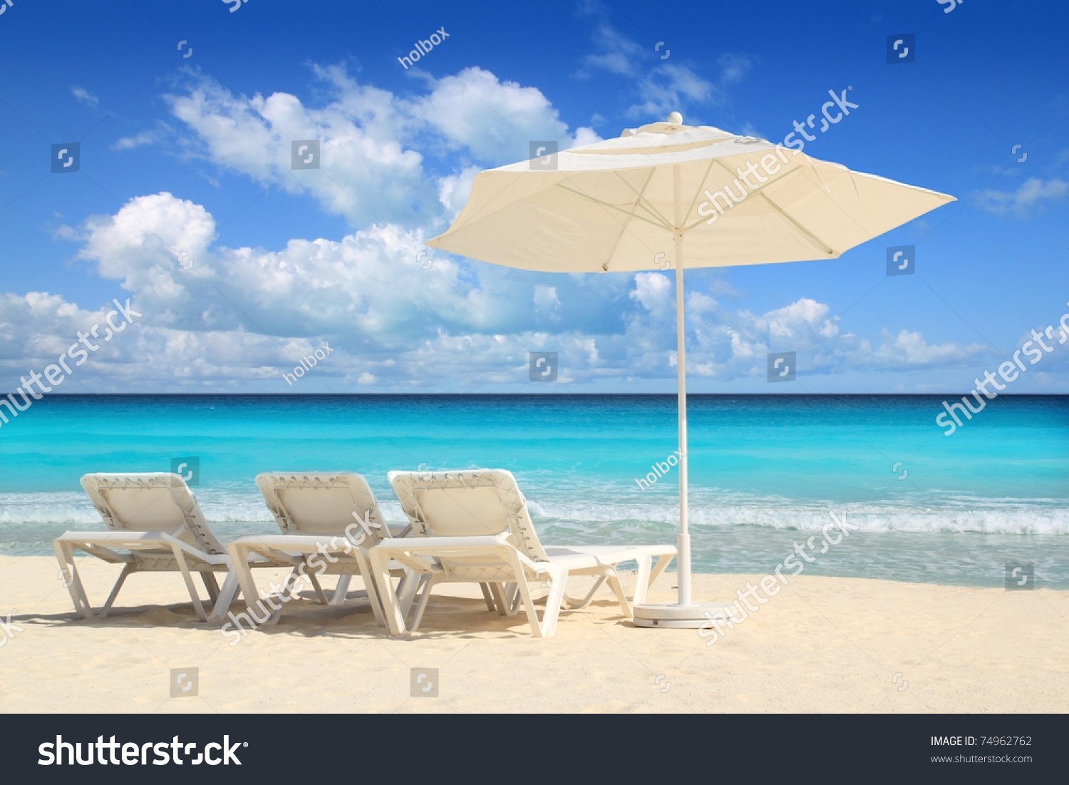 Caribbean beach parasol white umbrella and hammocks turquoise sea #74962762