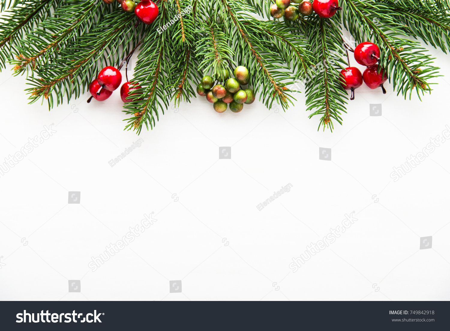 Christmas background with xmas tree and red berries on white wooden background. Merry christmas greeting card, frame, banner. Winter holiday theme. Happy New Year. Space for text. #749842918