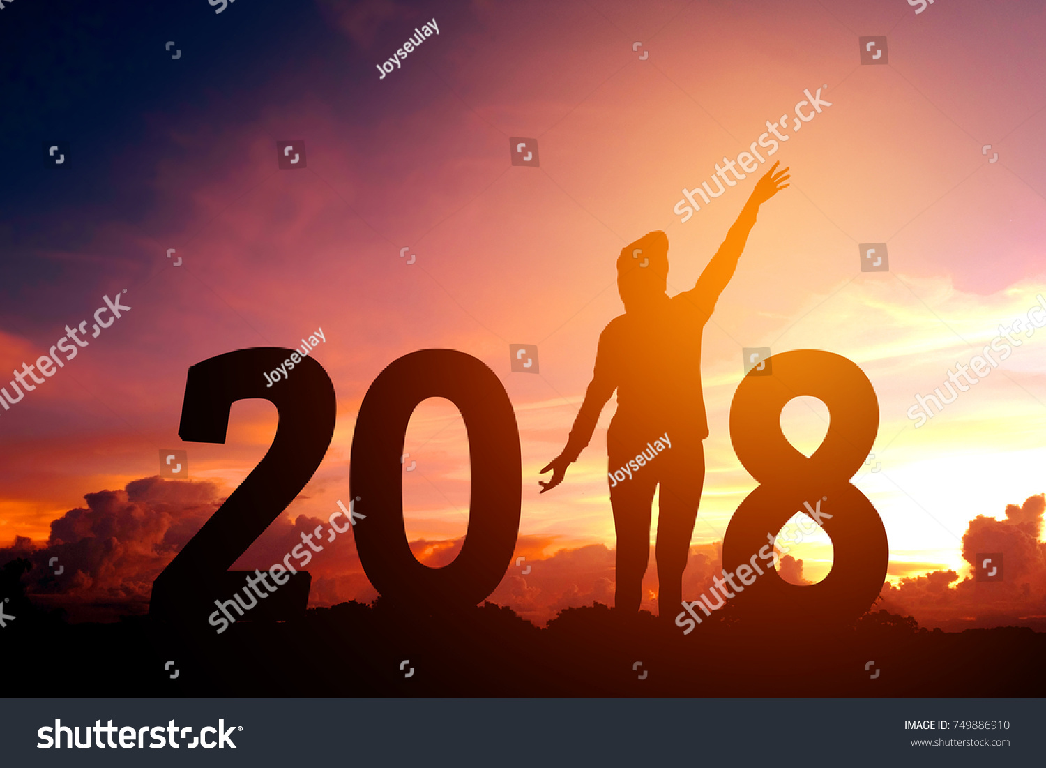 Silhouette young man Happy for 2018 new year #749886910