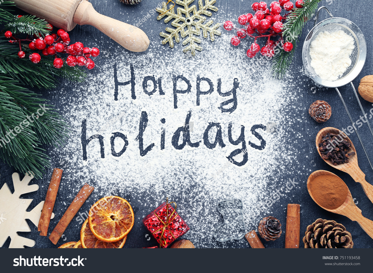 Inscription Happy Holidays on wheat flour background with fir-tree branches, orange fruits and cones #751193458
