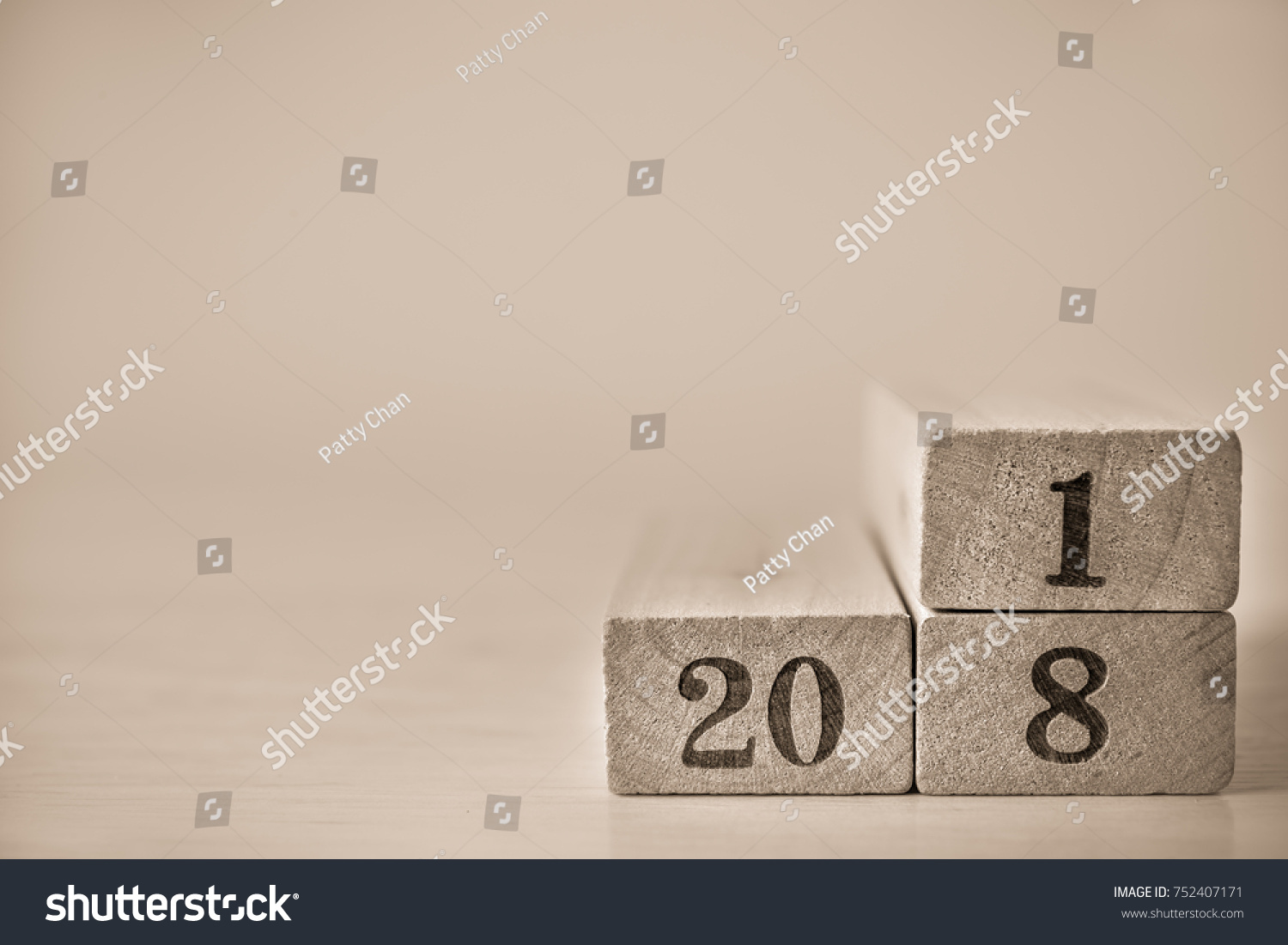 Happy New Year concept for 2018, Wood block number 2018 on wood table background and copy space for art work design or add text message. #752407171