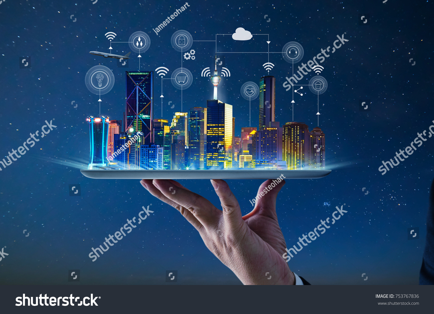 Waiter hand holding an empty digital tablet with Smart city with smart services and icons, internet of things, networks and augmented reality concept , night scene . #753767836