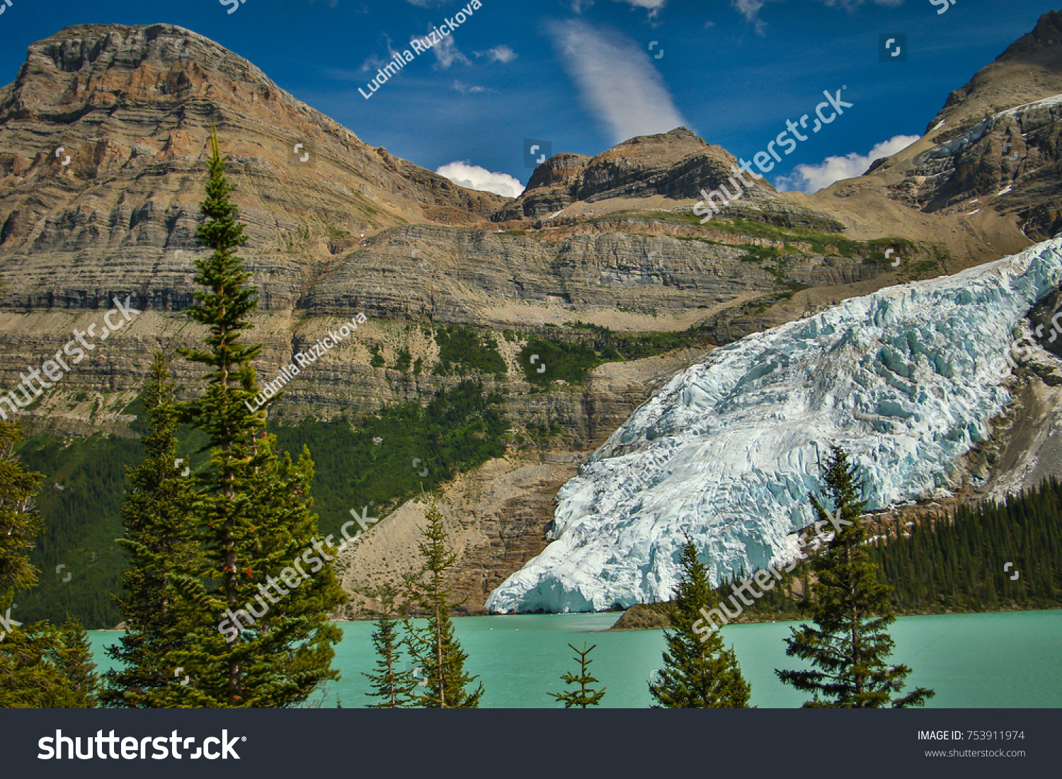 Berg glacier falling into Berg Lake, Mt. Robson provincial park, British Colombia, Canada #753911974