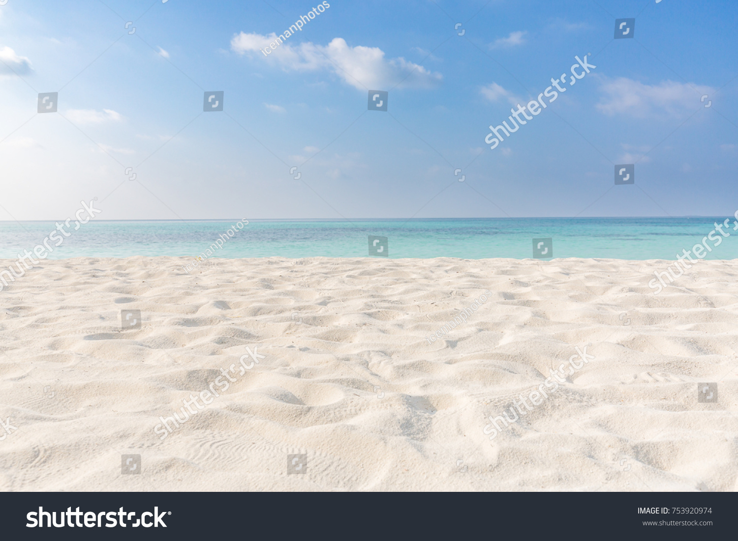 Summer beach background. Sand and sea and sky  #753920974