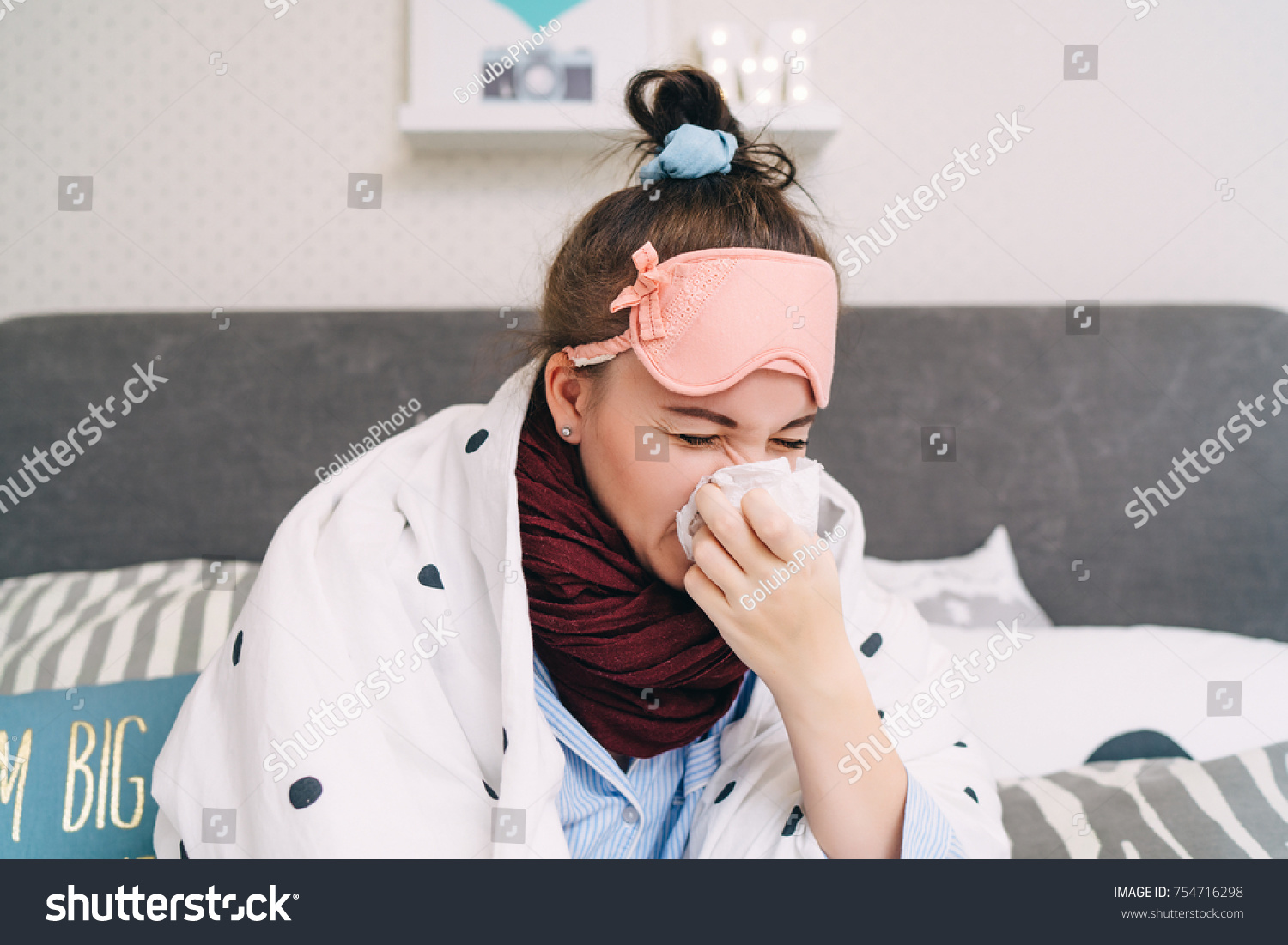 Young sick woman with cold and flu sneezing.  Seasonal influenza and virus. Healthcare concept #754716298