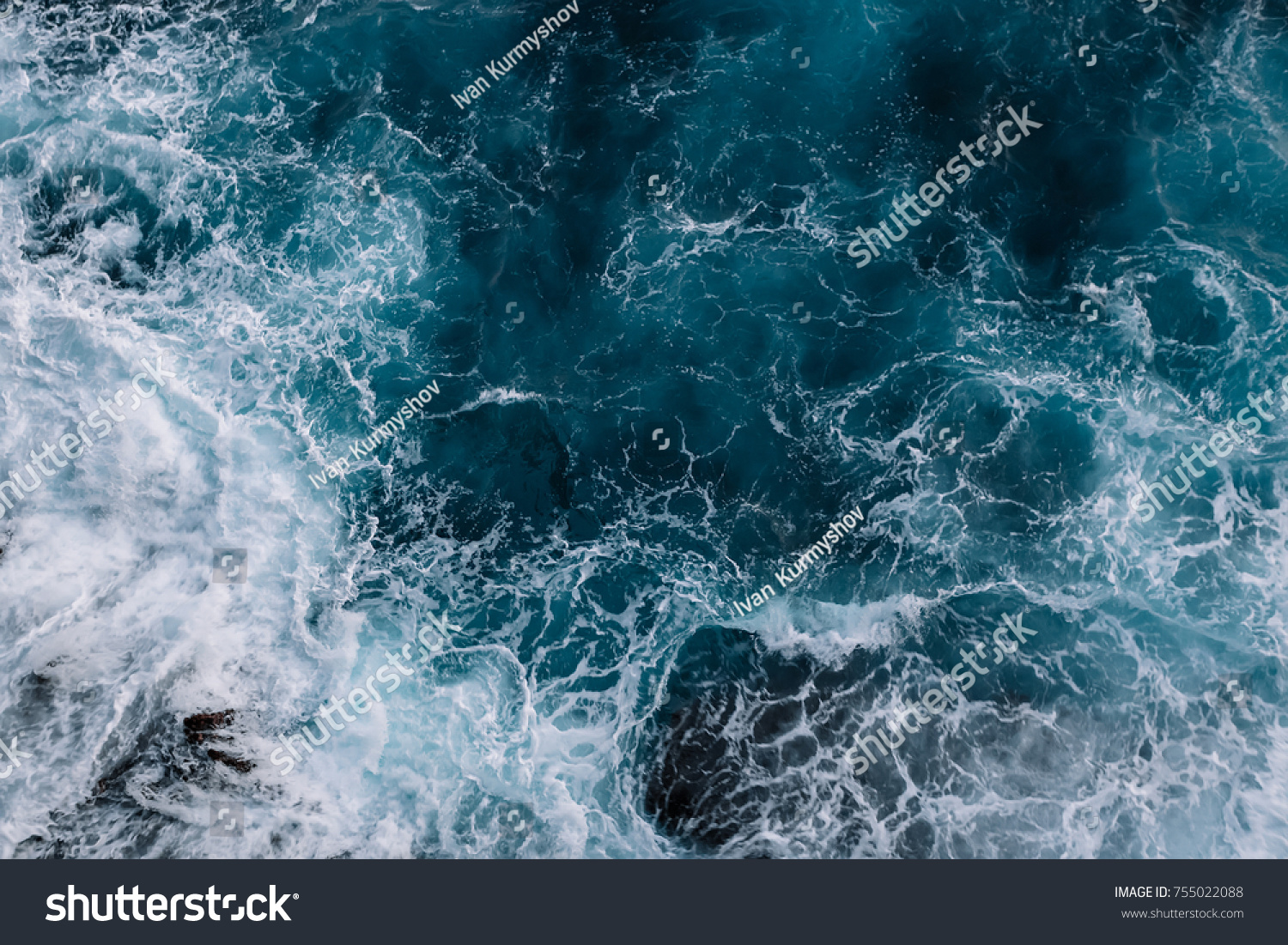 Aerial view to ocean waves. Blue water background #755022088