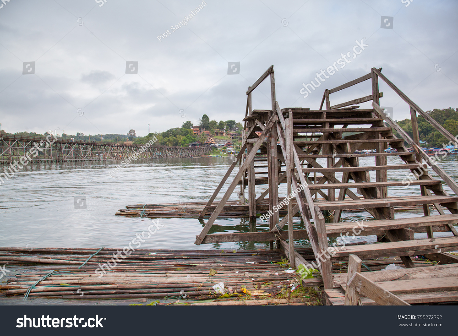 wood bridge on the songalia river  #755272792