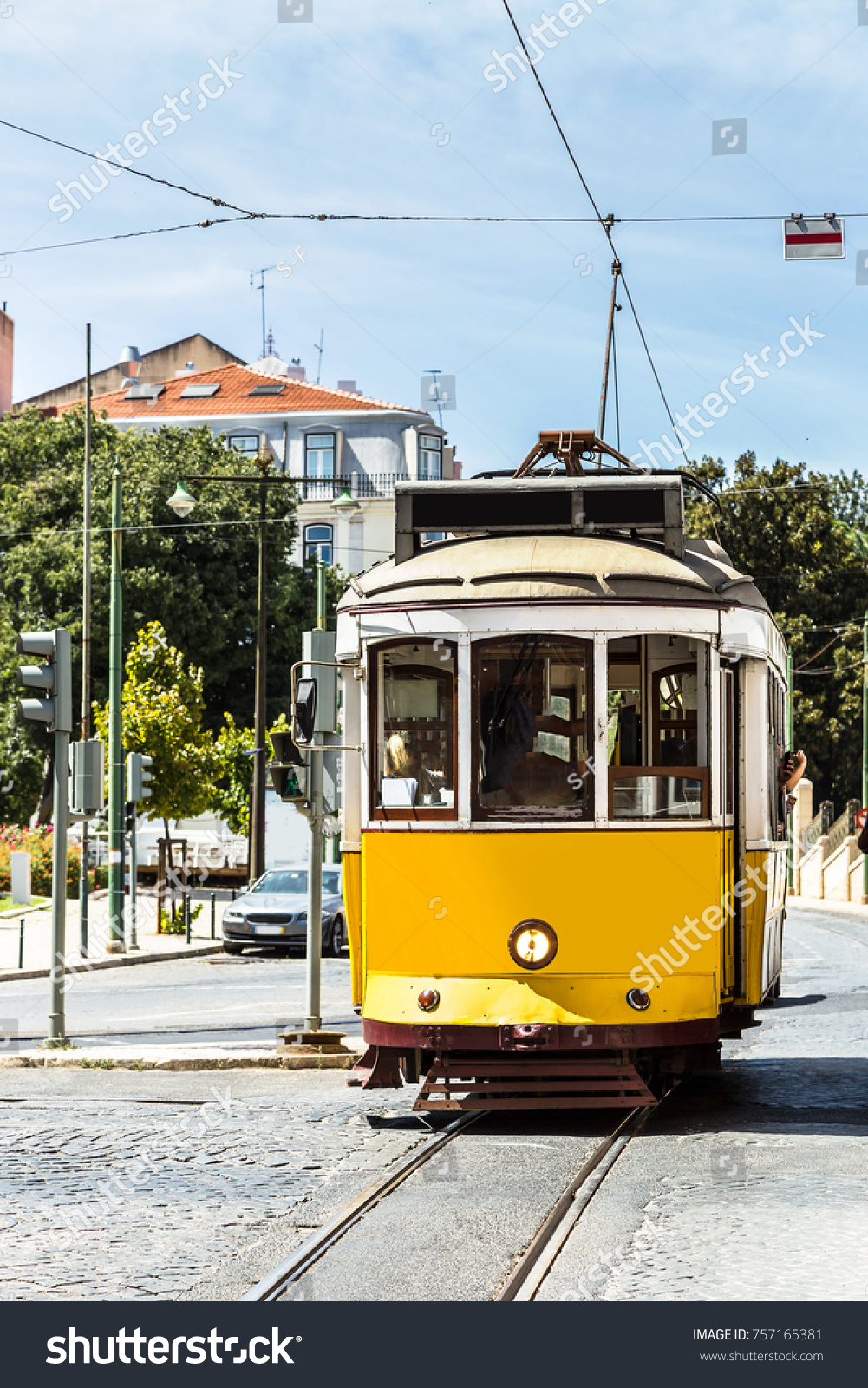 Vintage tram in the city center of Lisbon, Portugal in a summer day #757165381