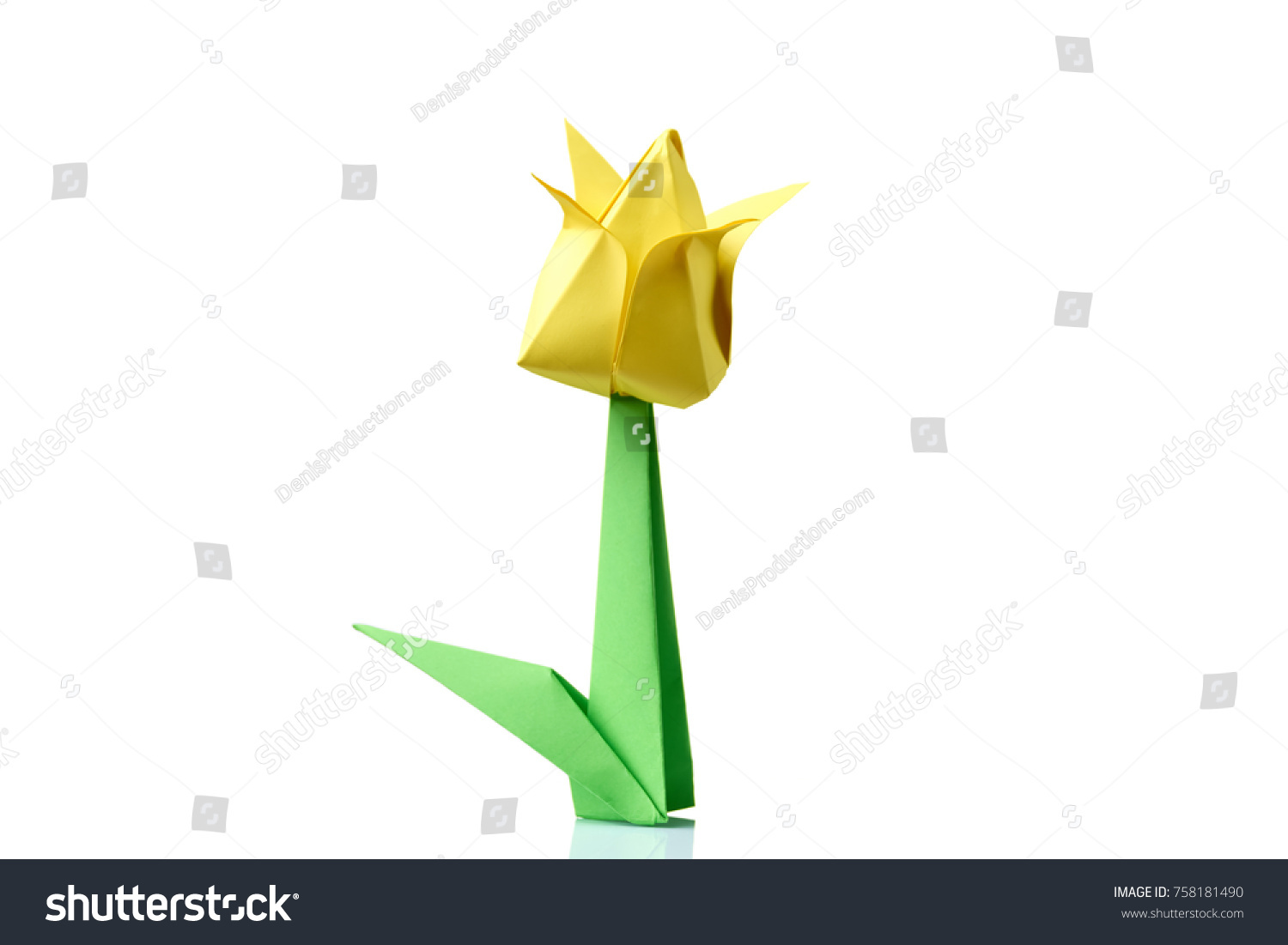 Yellow tulip origami flower. Traditional model of bulb and leaf. Simple origami crafting for beginners. #758181490