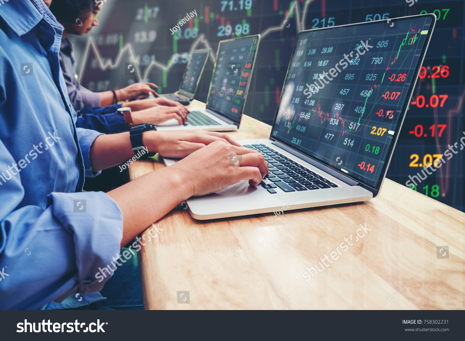 Business Team Investment Entrepreneur Trading working on Laptop Stock market exchange information and Trading graph #758302231