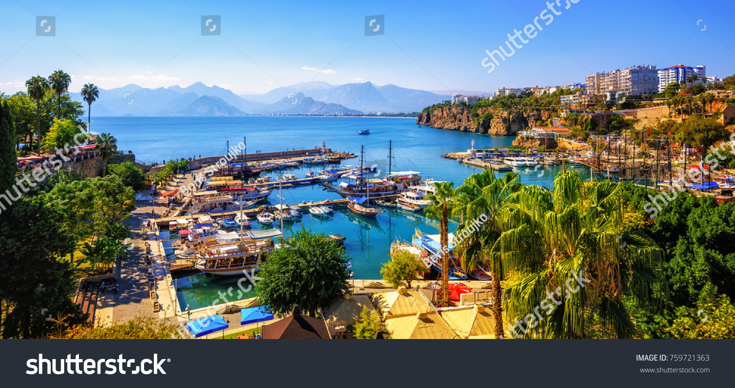 Panoramic view of Antalya Old Town port, Taurus mountains and Mediterrranean Sea, Turkey #759721363