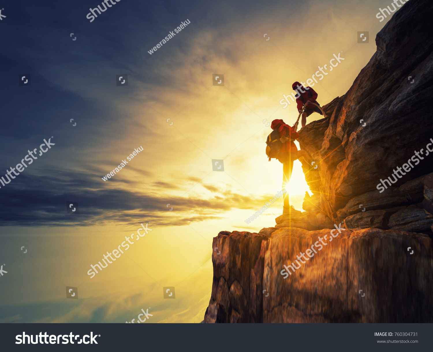 Asia couple hiking help each other silhouette in mountains with sunlight. #760304731