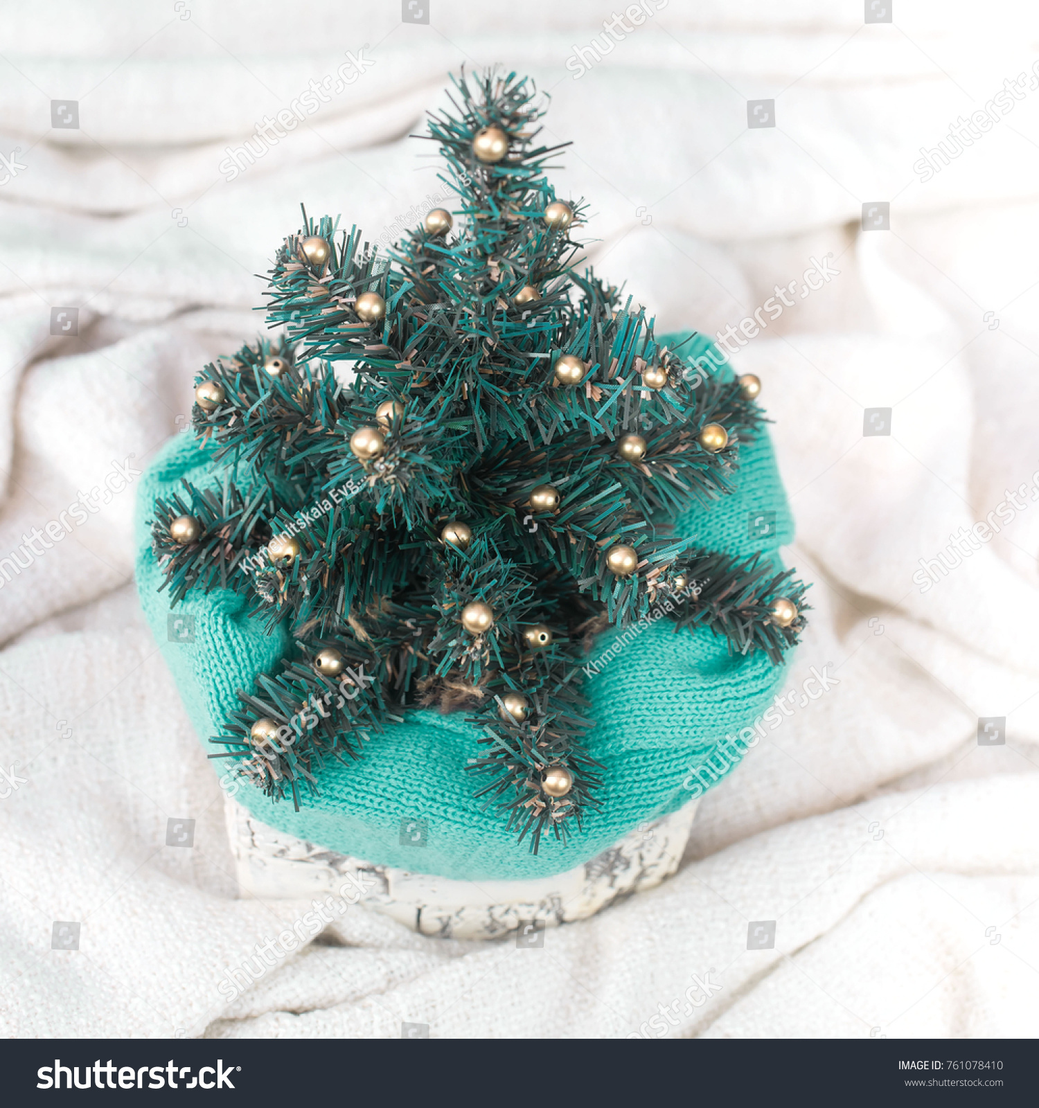 Decorative Christmas tree in a pot. The view from the top. Square. #761078410