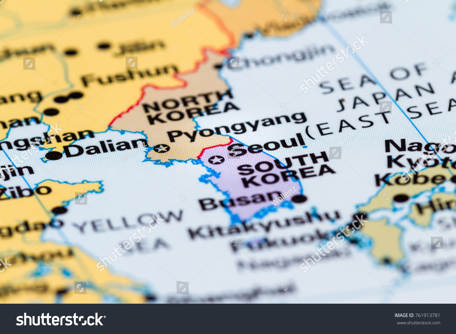 close up of a world map with the border between  North and South Korea in focus #761913781