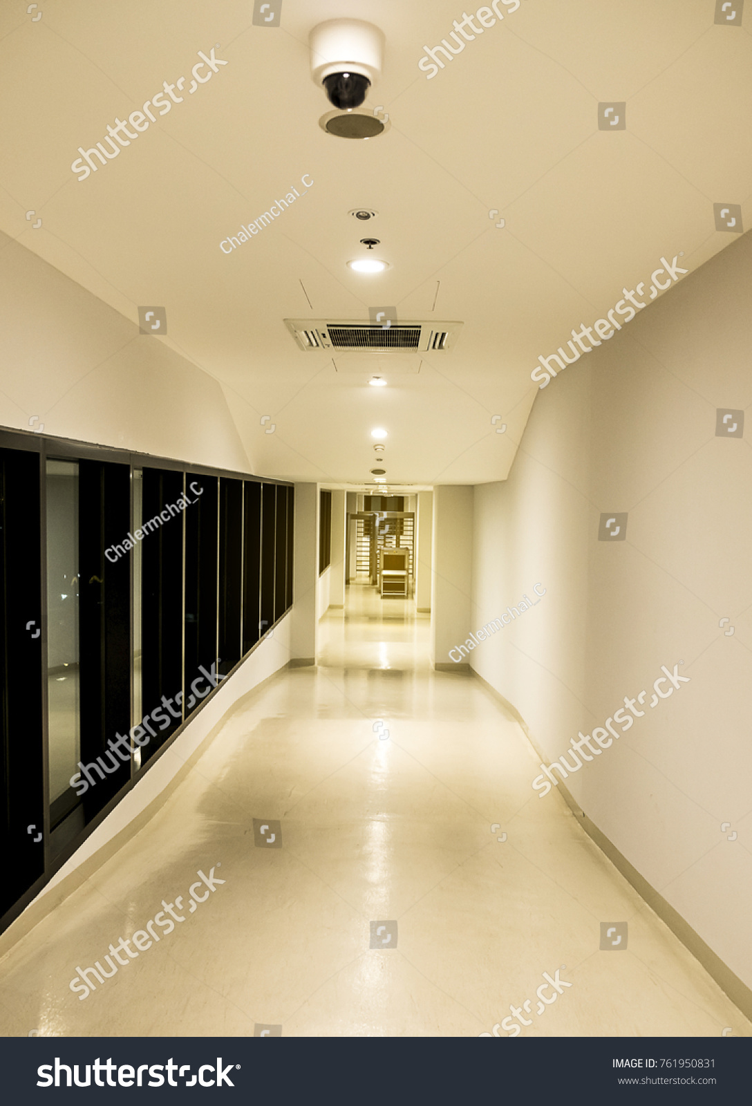The hallway connects to the parking lot. #761950831