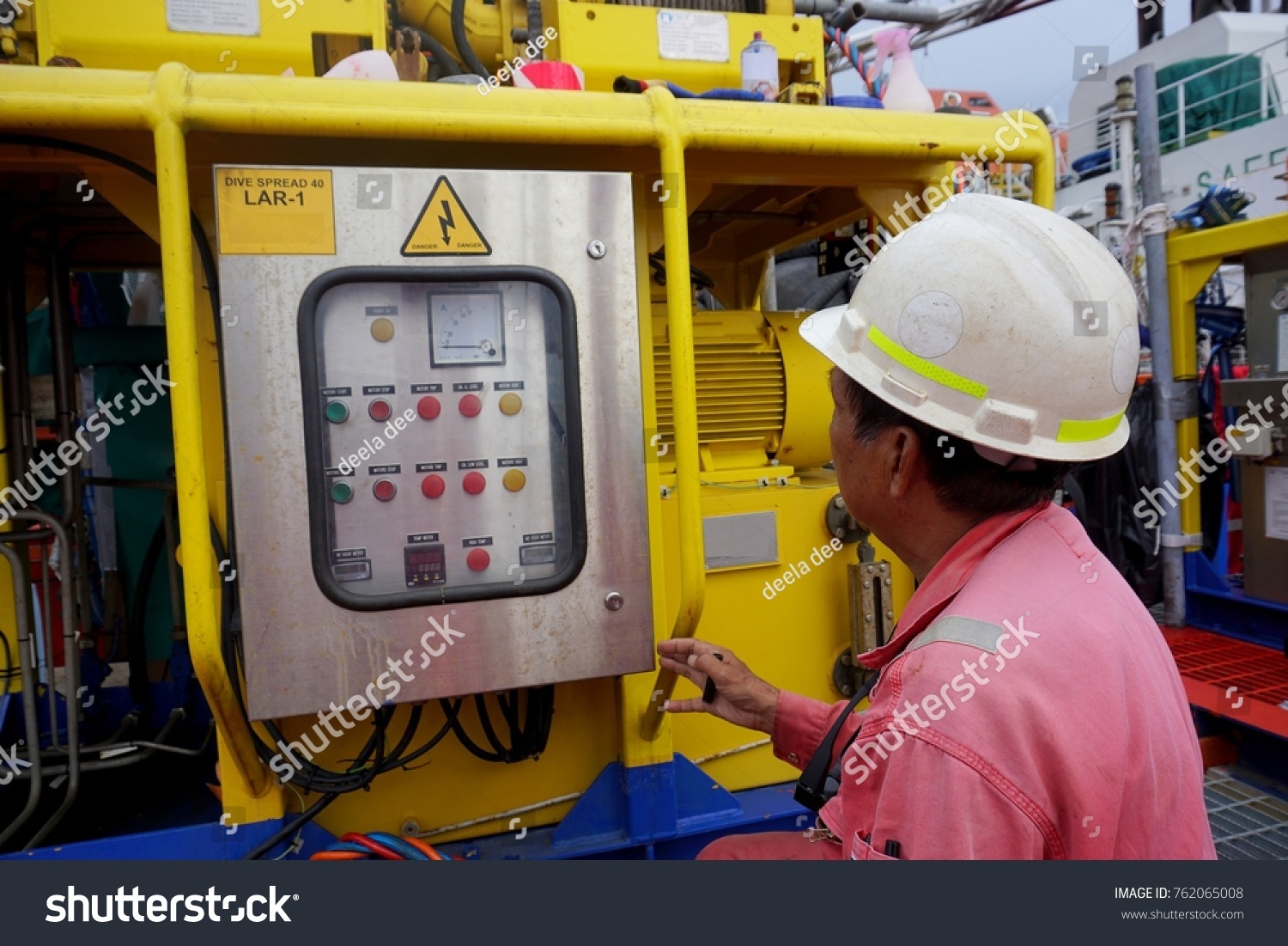 SARAWAK, MALAYSIA - MAY 30th, 2017: Unidentified offshore worker doing maintenance to the dive spread LAR-1. #762065008