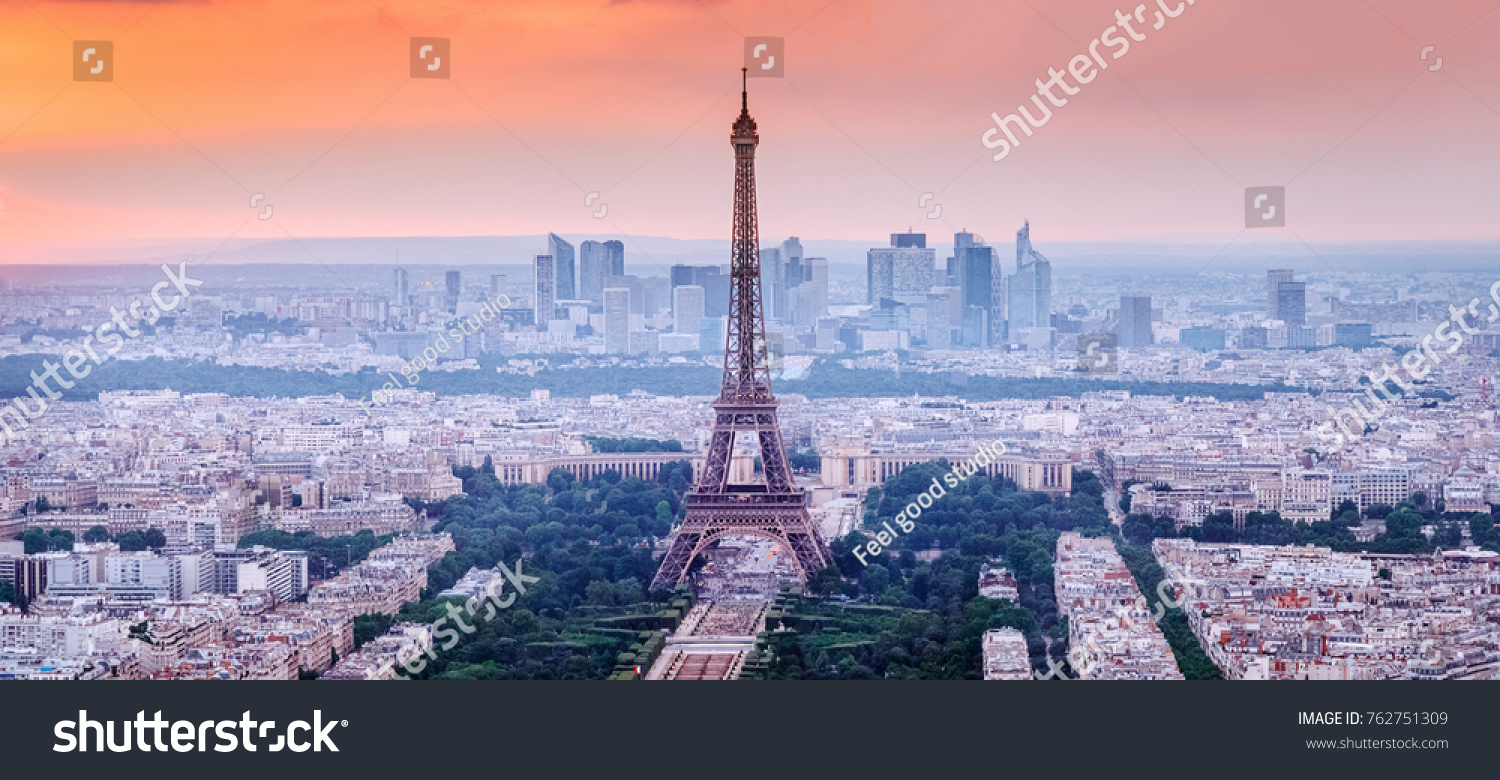 Paris, France. Panoramic view of Paris skyline with Eiffel Tower in the center. Amazing sunset scenery with dramatic sky. #762751309