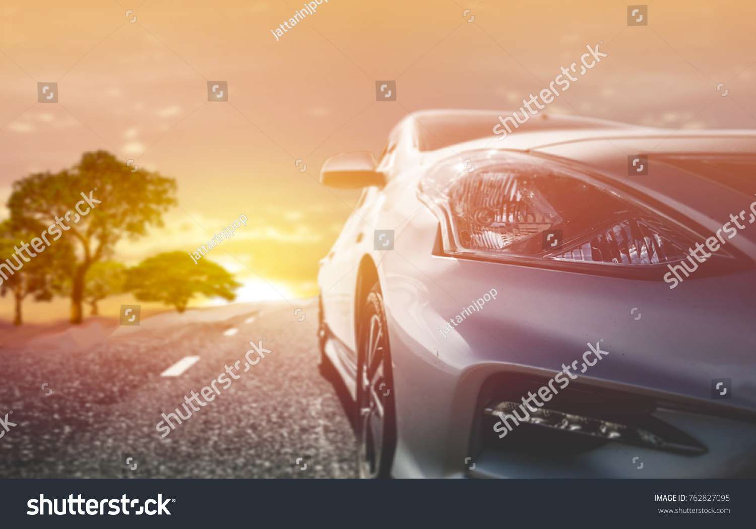 Car traveling in nature on an asphalt road - Front view #762827095