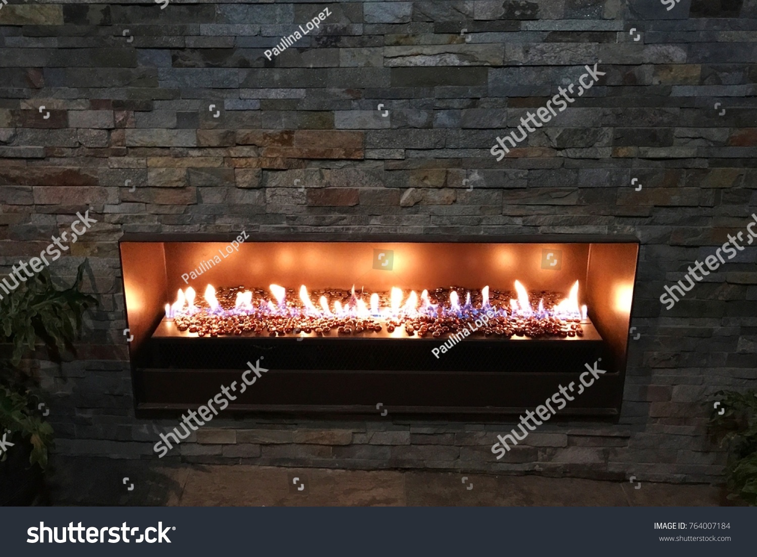 Backyard fireplace in the City #764007184