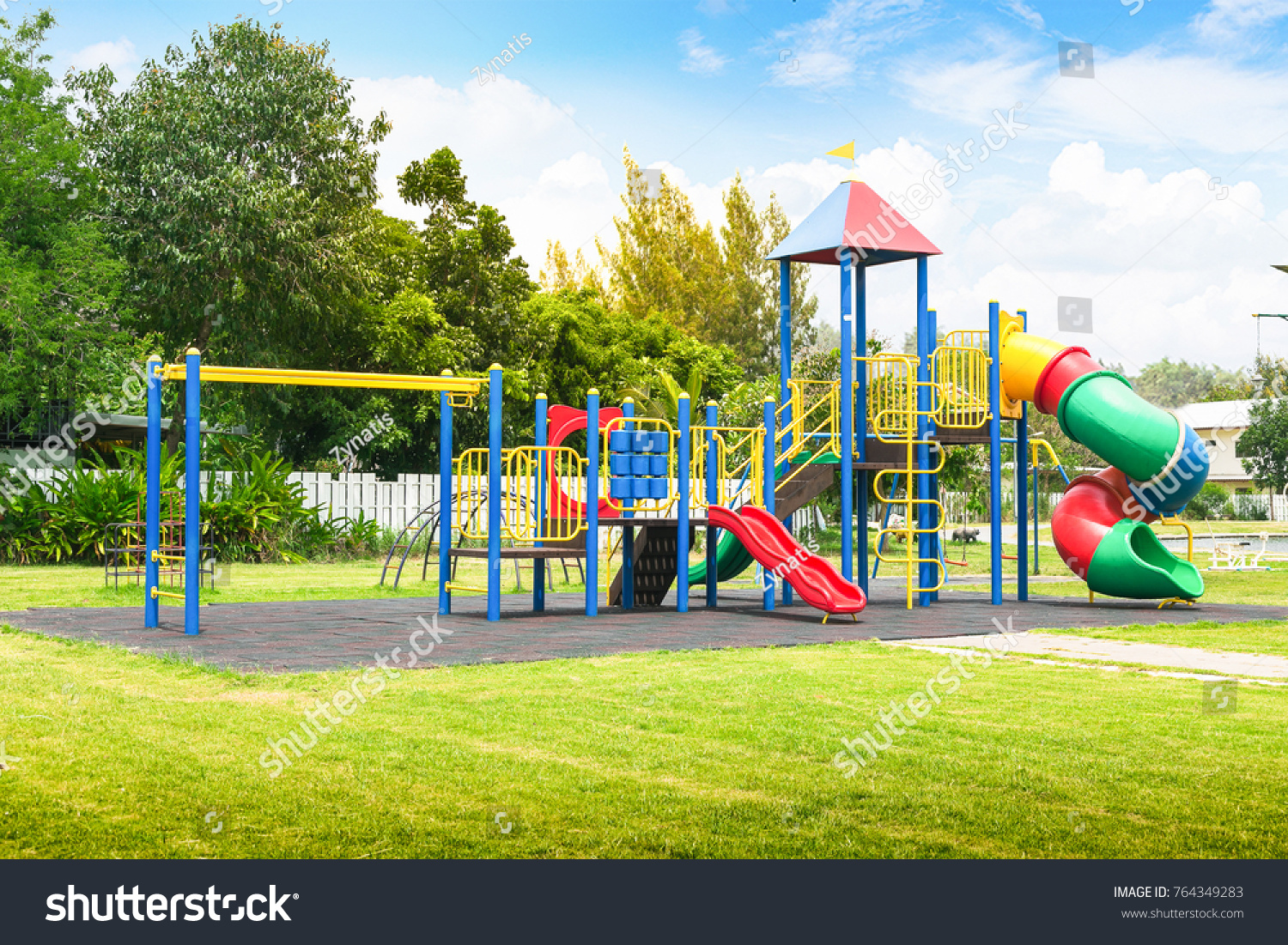 Colorful playground on yard in the park. #764349283
