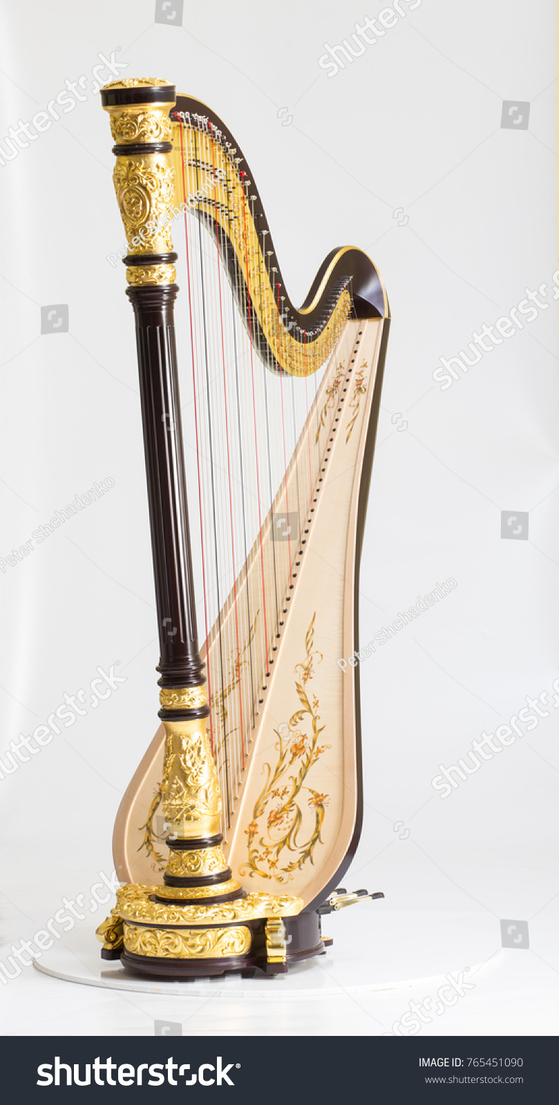Classical music instrument. Pedal harp #765451090