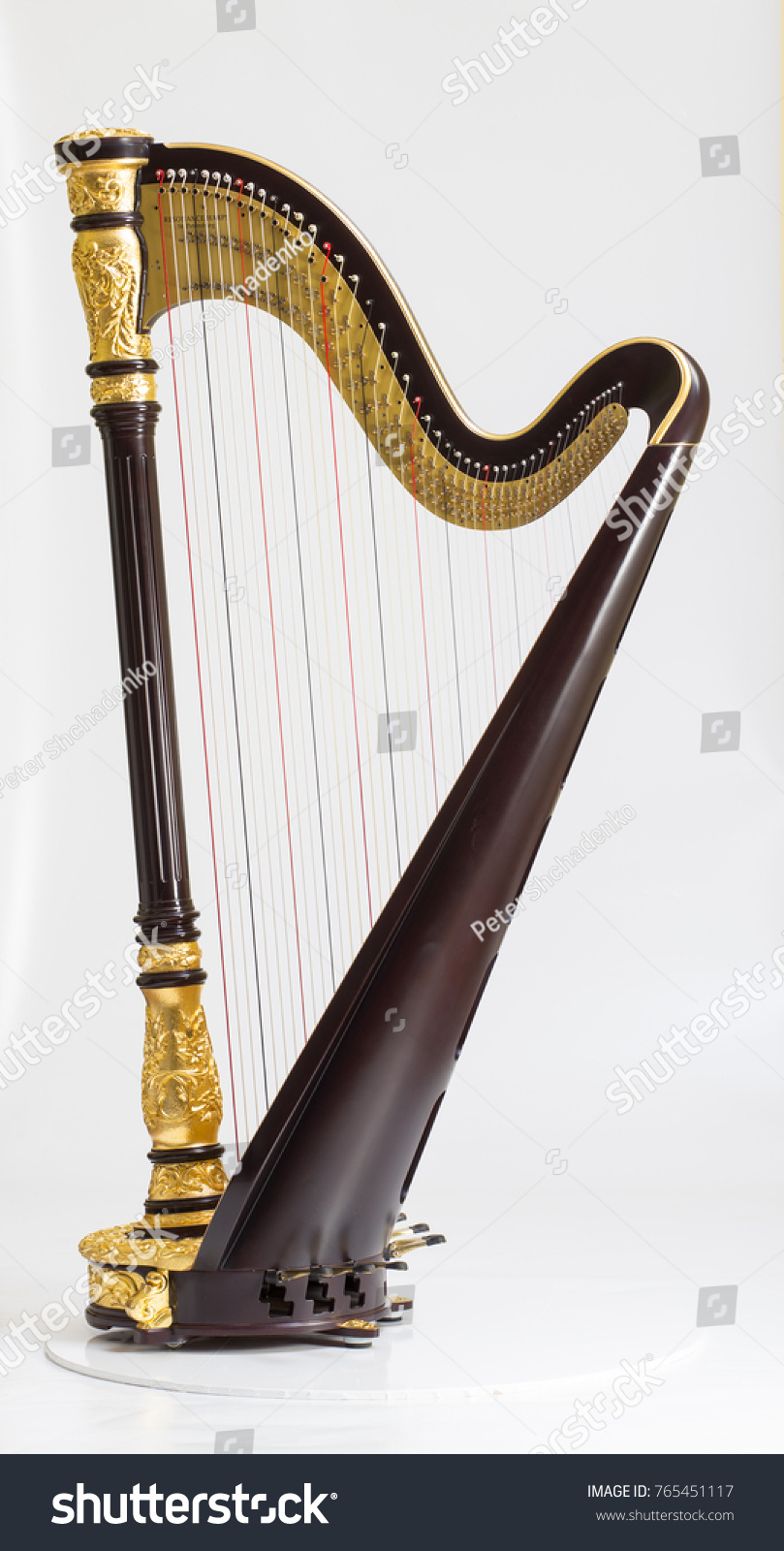 Classical music instrument. Pedal harp #765451117