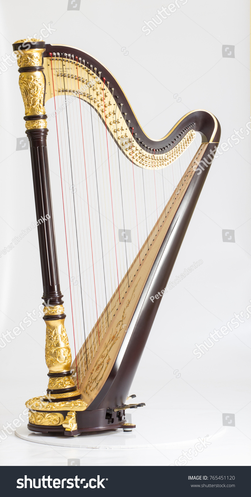 Classical music instrument. Pedal harp #765451120