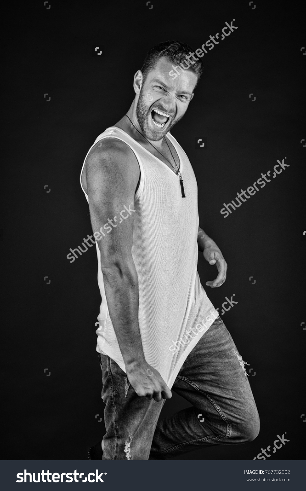 Fashion and beauty. Fashion model on grey background. Man with happy unshaven face in studio. Style and look, barber. Handsome mucho guy in vest, black and white #767732302