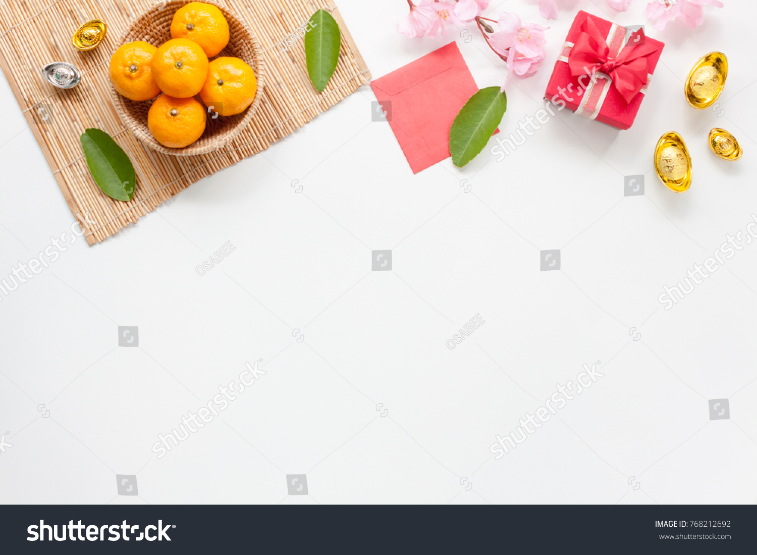 Flat lay of accessories Chinese new year and decorations Lunar new year festival concept background.Difference items on modern white wooden at office.Other language mean rich or wealthy and happy. #768212692