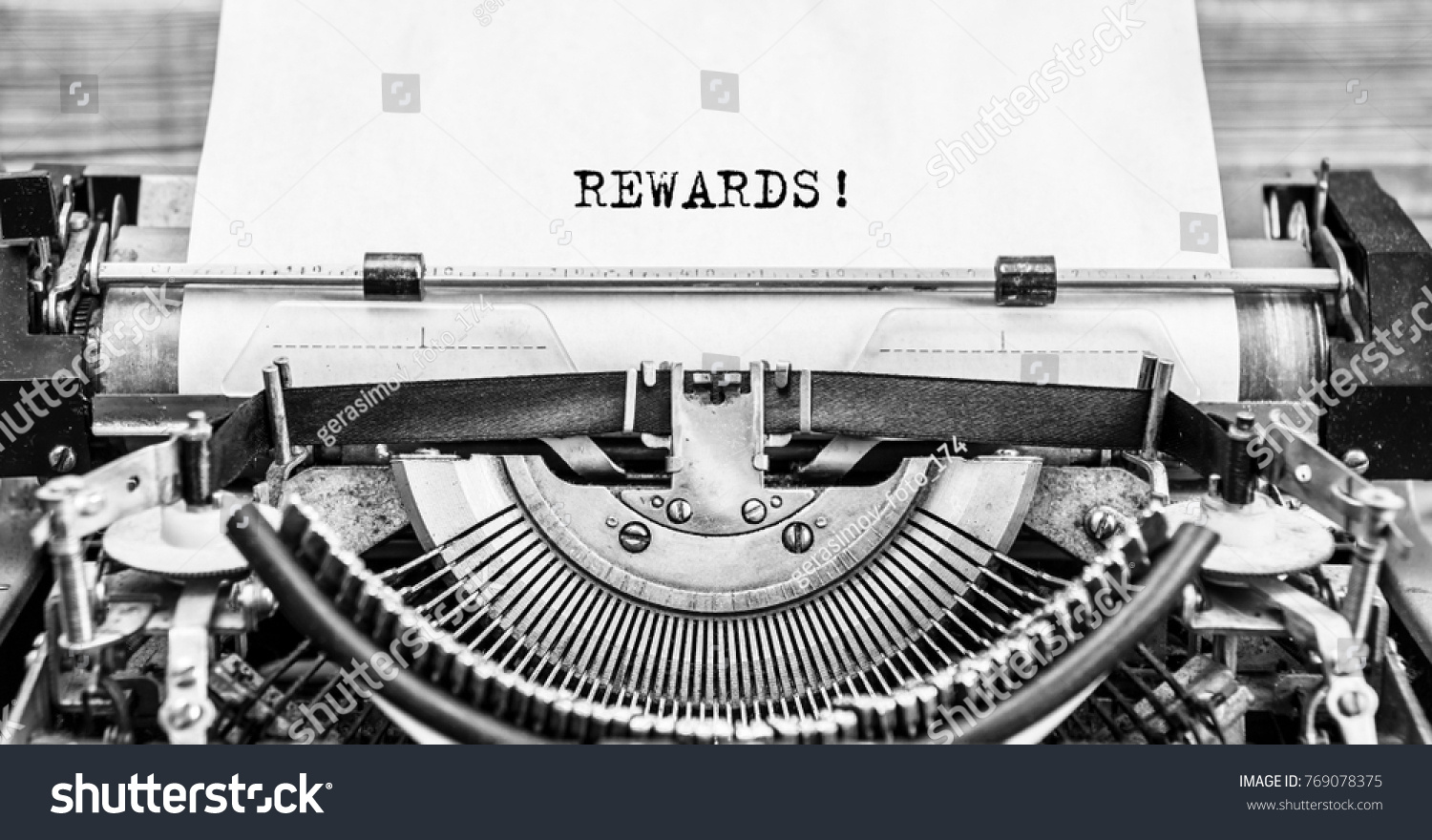 Word REWARDS typed on retro typewriter, old, vintage. close up. #769078375