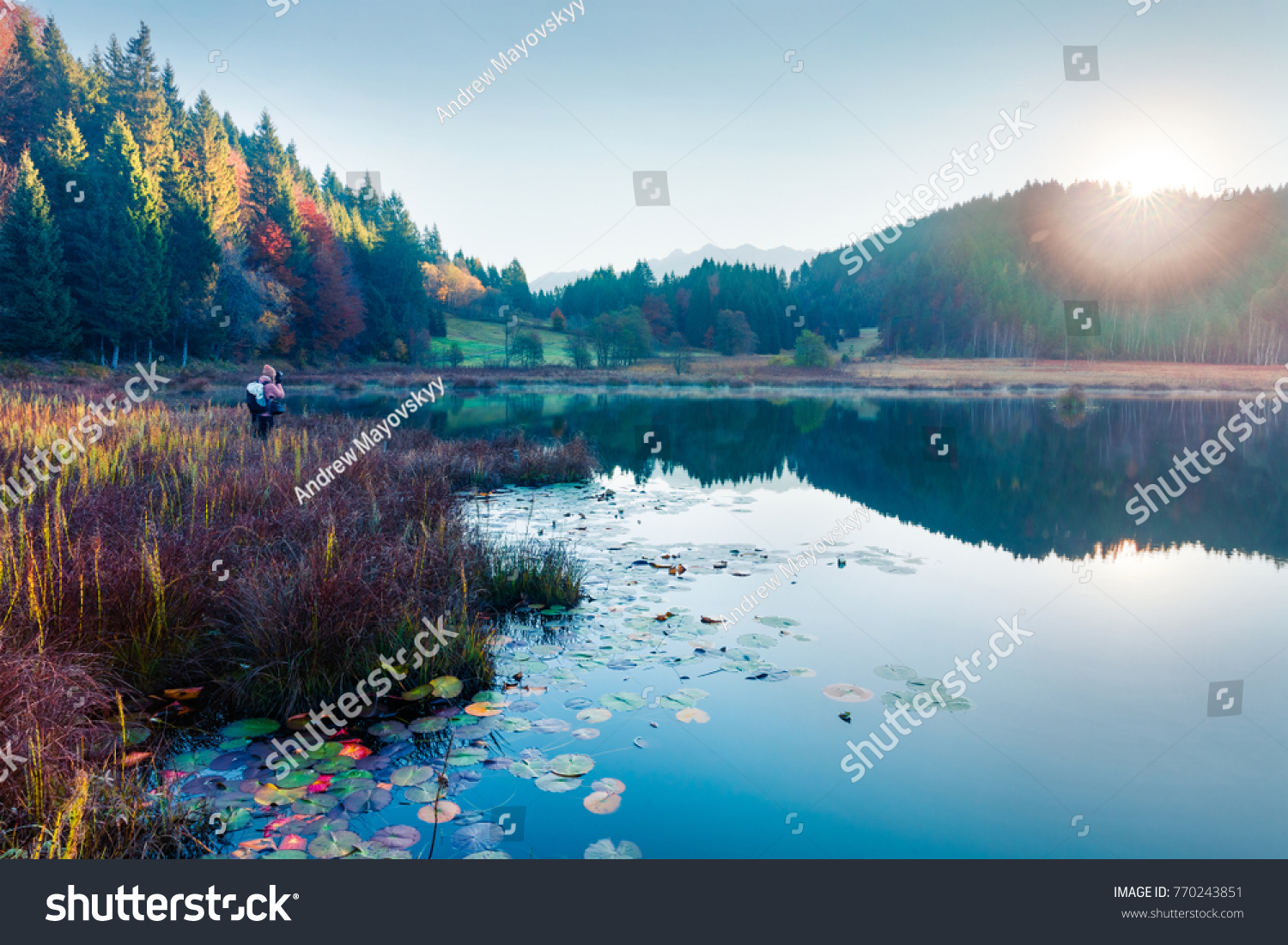 Misty morning scene of Wagenbruchsee lake. Photographer takes pictures of beautifel autumn view of Bavarian Alps, Germany, Europe. Traveling concept background.
 #770243851