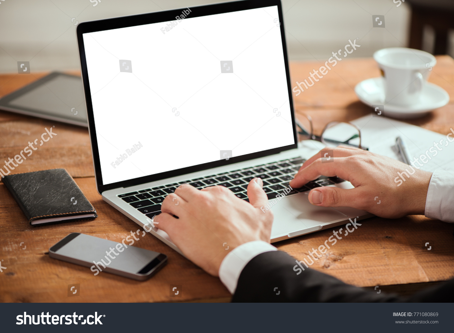 Business man hands typing on laptop pc #771080869