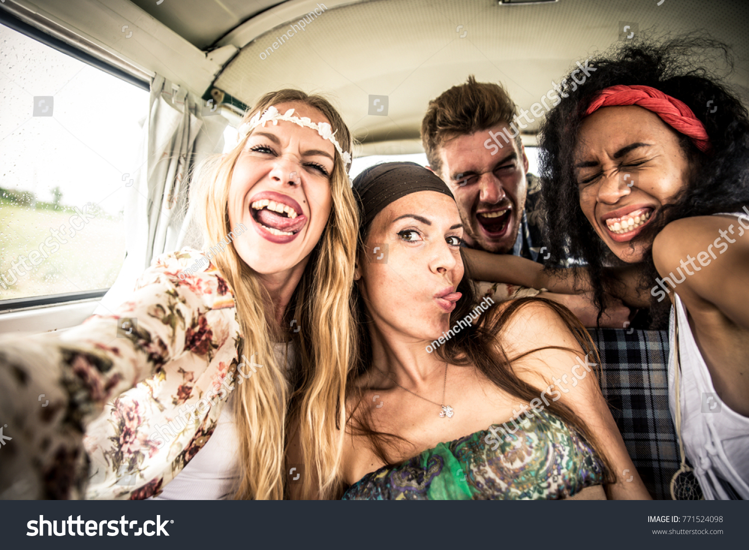 Hippie friends driving on a minivan #771524098