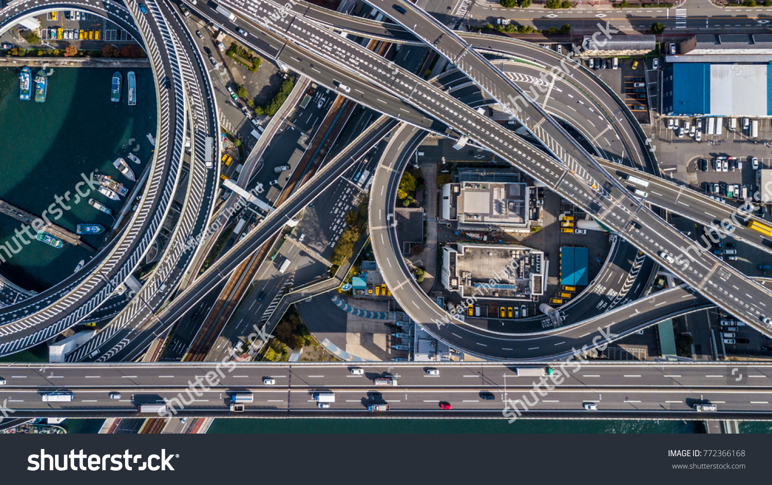 Top view over the highway, expressway and motorway architecture, Aerial view overhead infrastructure interchange transport of Osaka City, Osaka, Kansai, Japan. #772366168