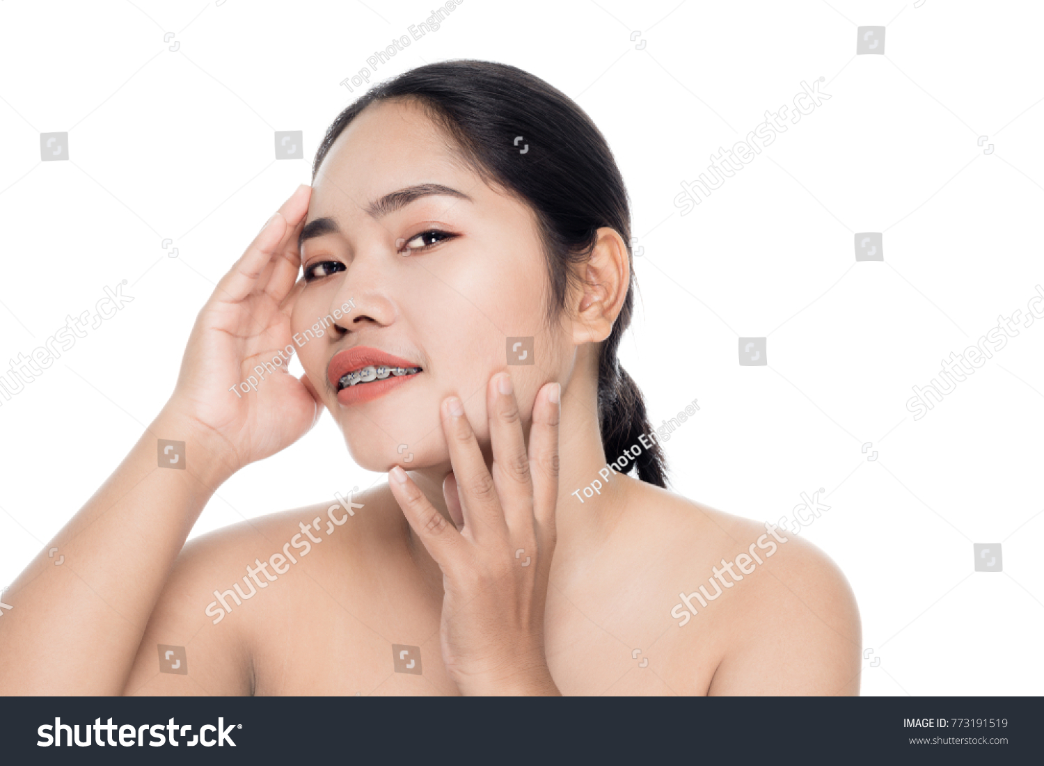Beautiful woman face close up portrait studio on white background #773191519