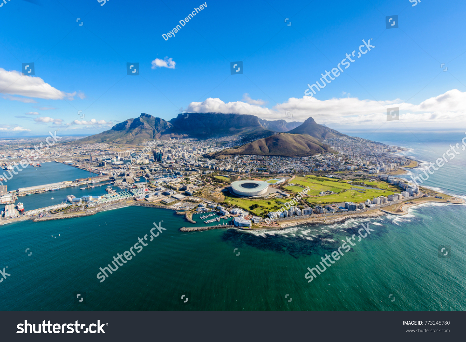 Aerial view of Cape Town, South Africa on a sunny afternoon. Photo taken from a helicopter during air tour of Cape Town #773245780