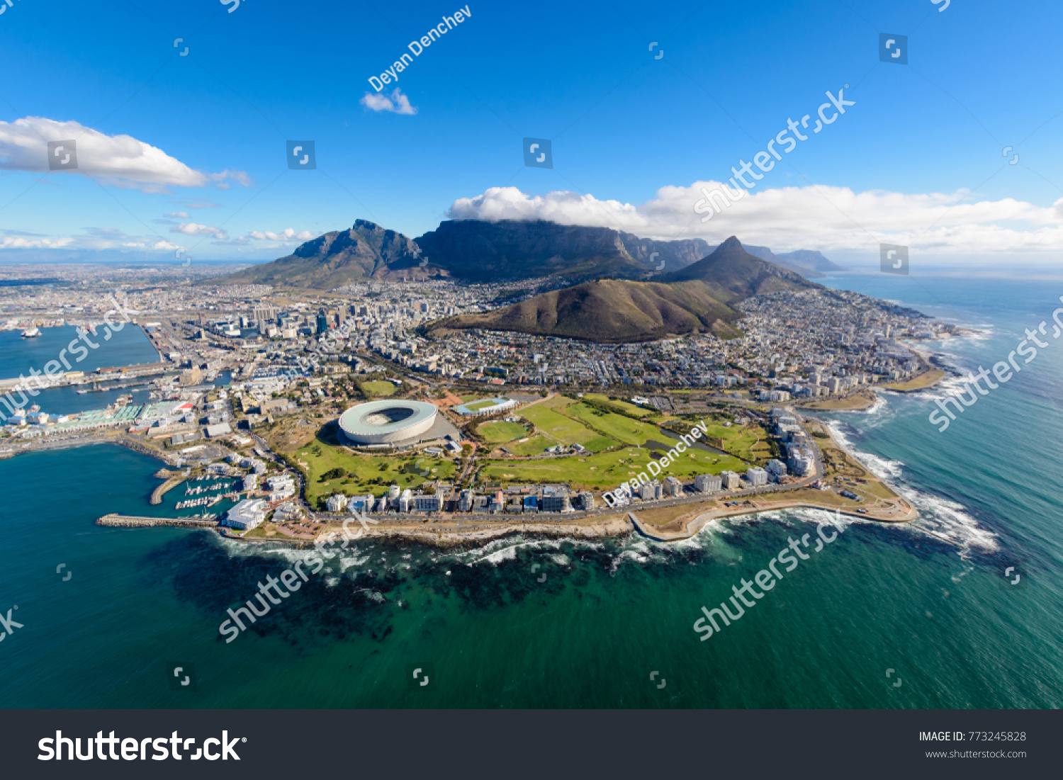 Aerial view of Cape Town, South Africa on a sunny afternoon. Photo taken from a helicopter during air tour of Cape Town #773245828