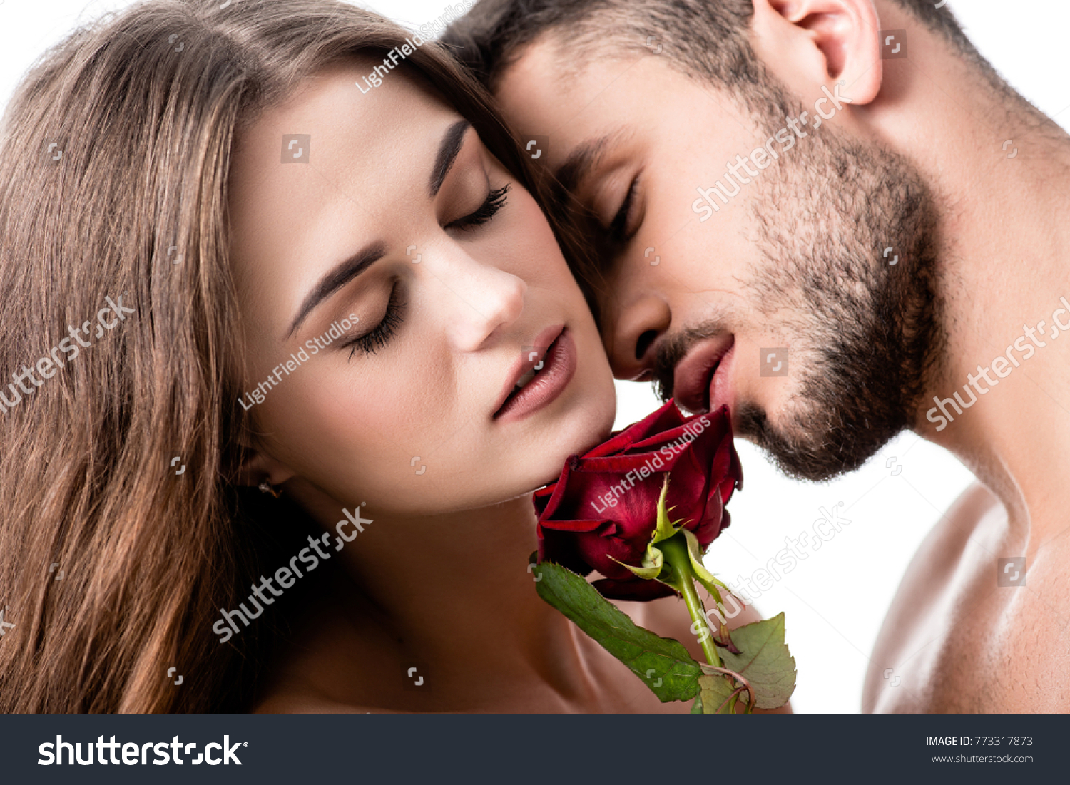 acctractive sensual couple with rose isolated on white #773317873
